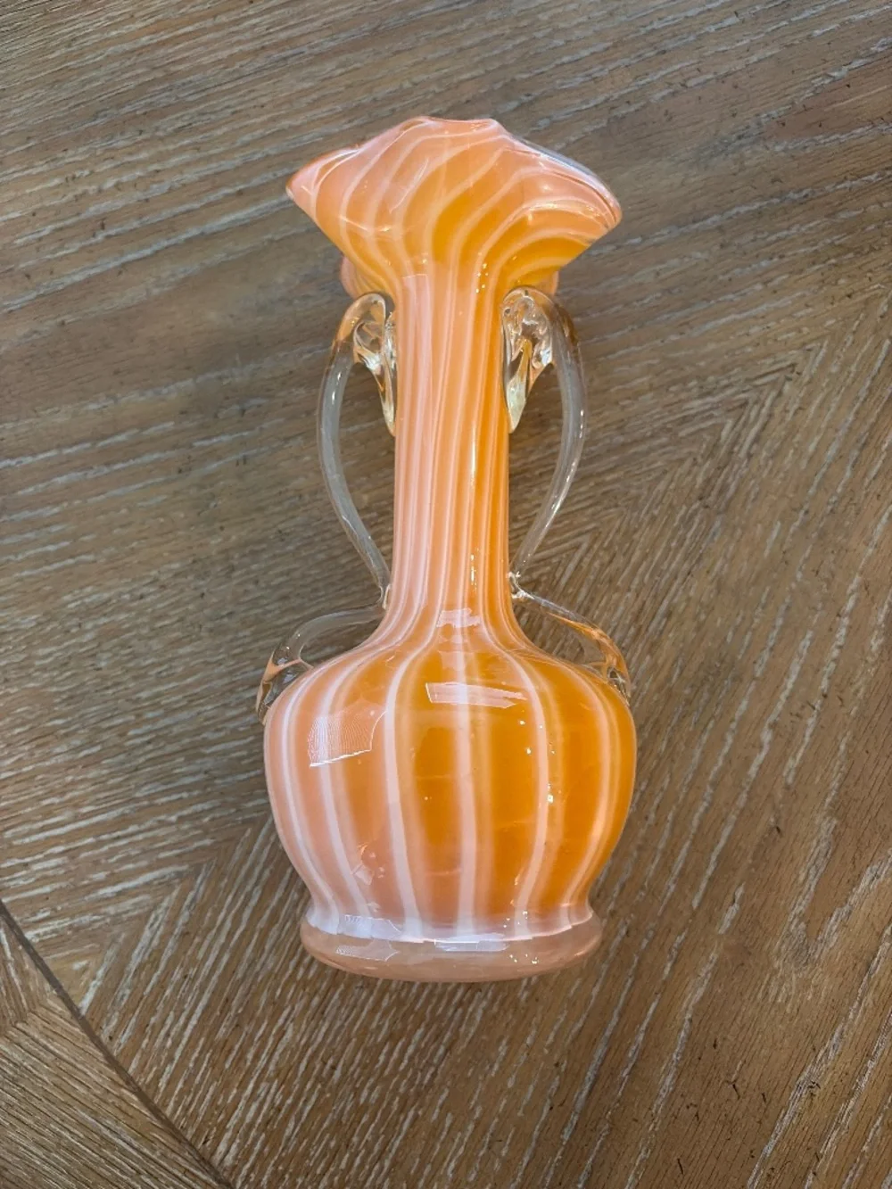 Marano hand blown orange and white vase.
